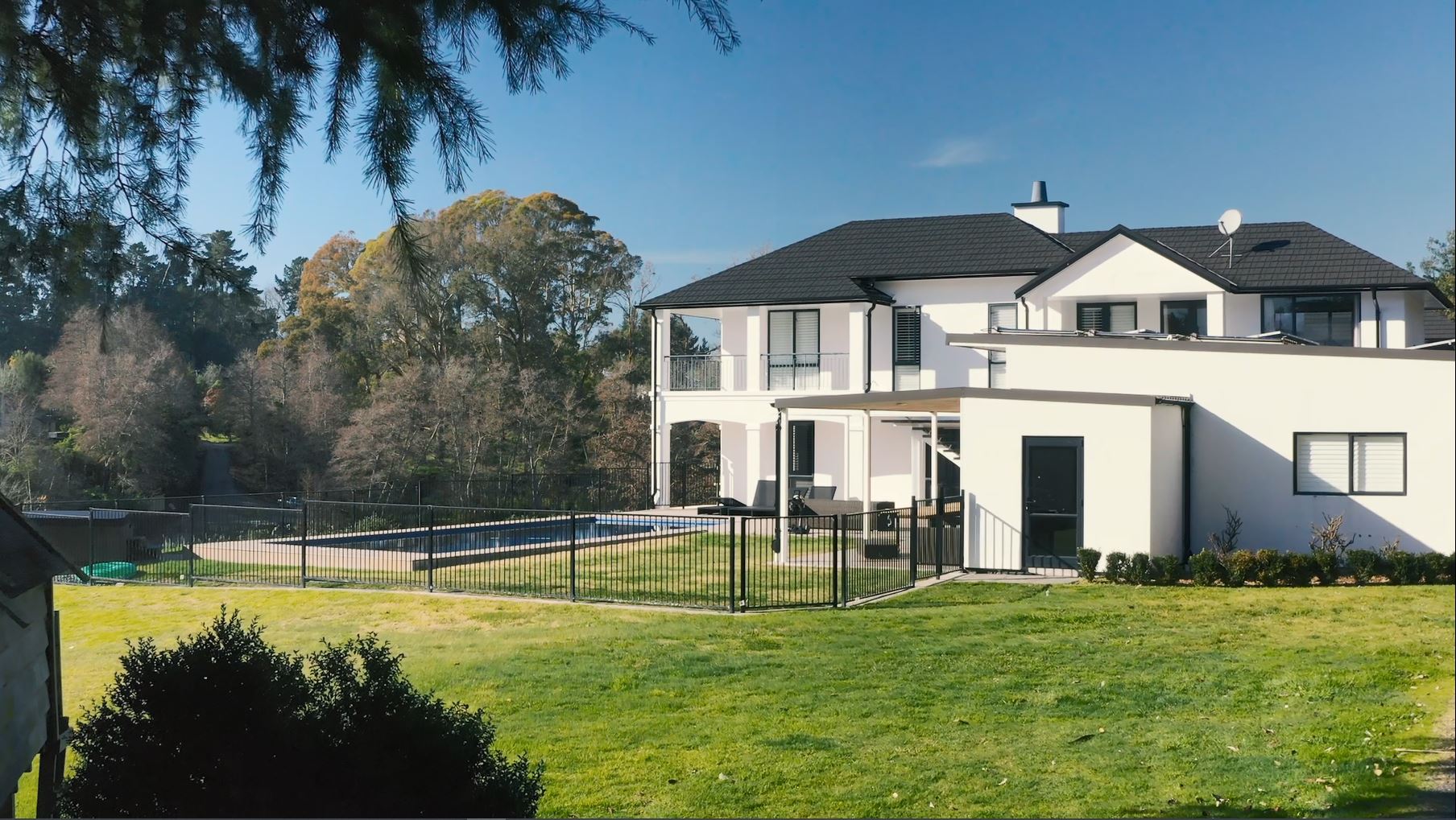 Substantial home re-roofed with our Concealed Fastening Shake product in Charcoal Blend.